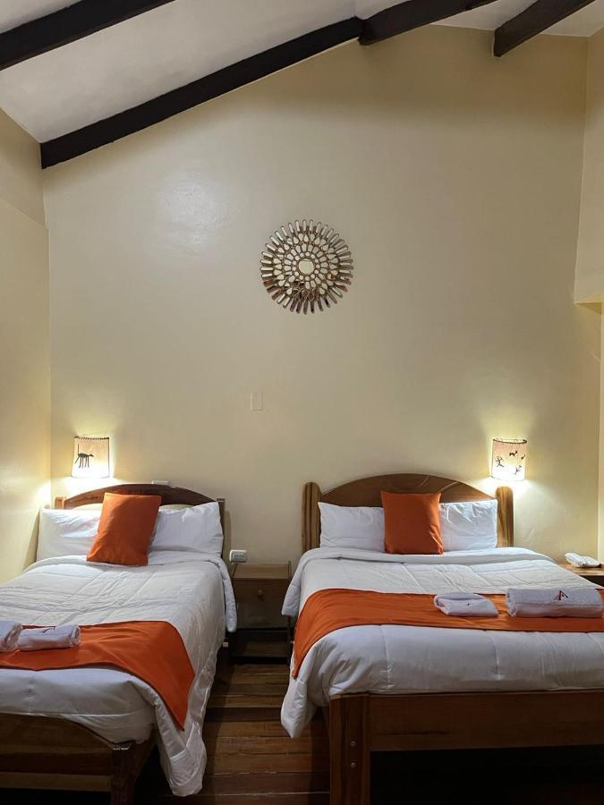 Отель Hostal Andenes De Alabado Куско Экстерьер фото