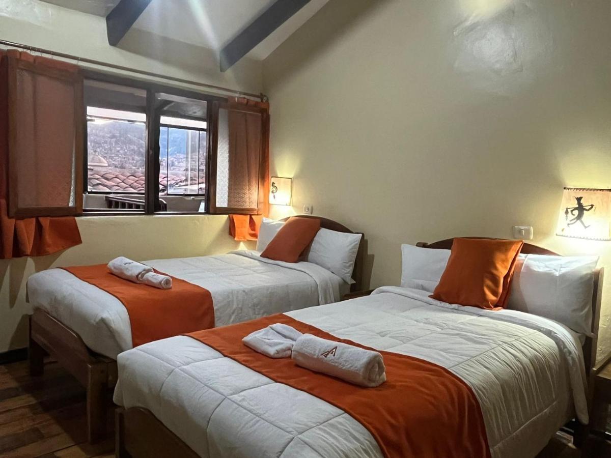 Отель Hostal Andenes De Alabado Куско Экстерьер фото