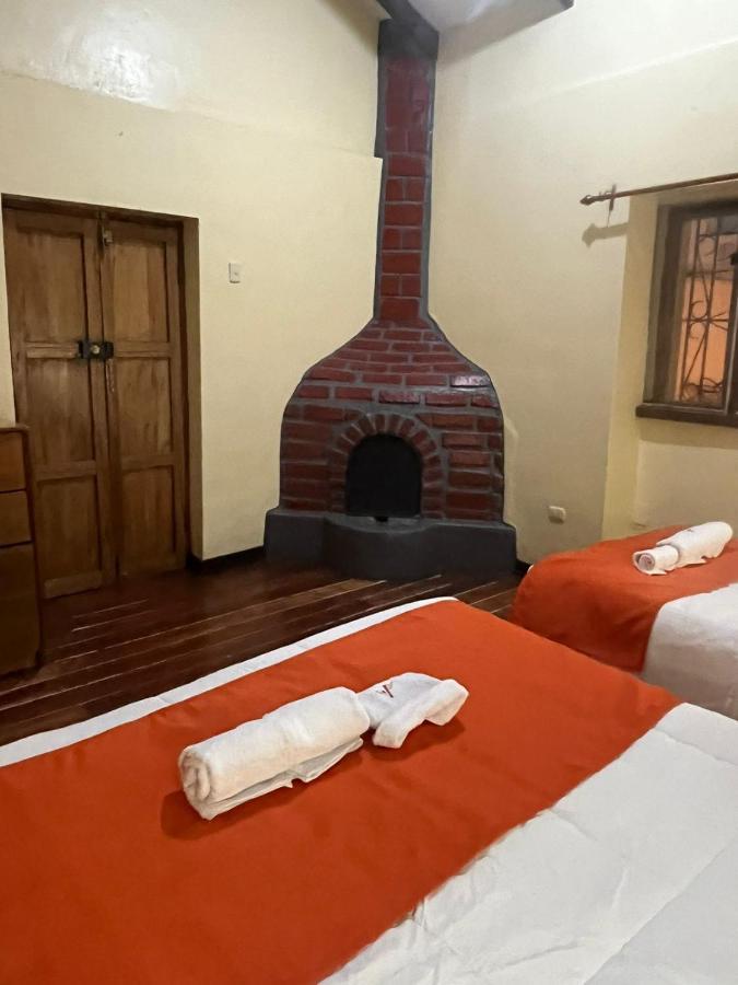 Отель Hostal Andenes De Alabado Куско Экстерьер фото