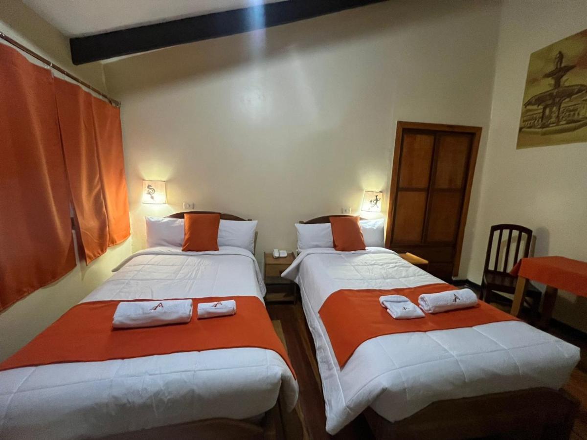 Отель Hostal Andenes De Alabado Куско Экстерьер фото